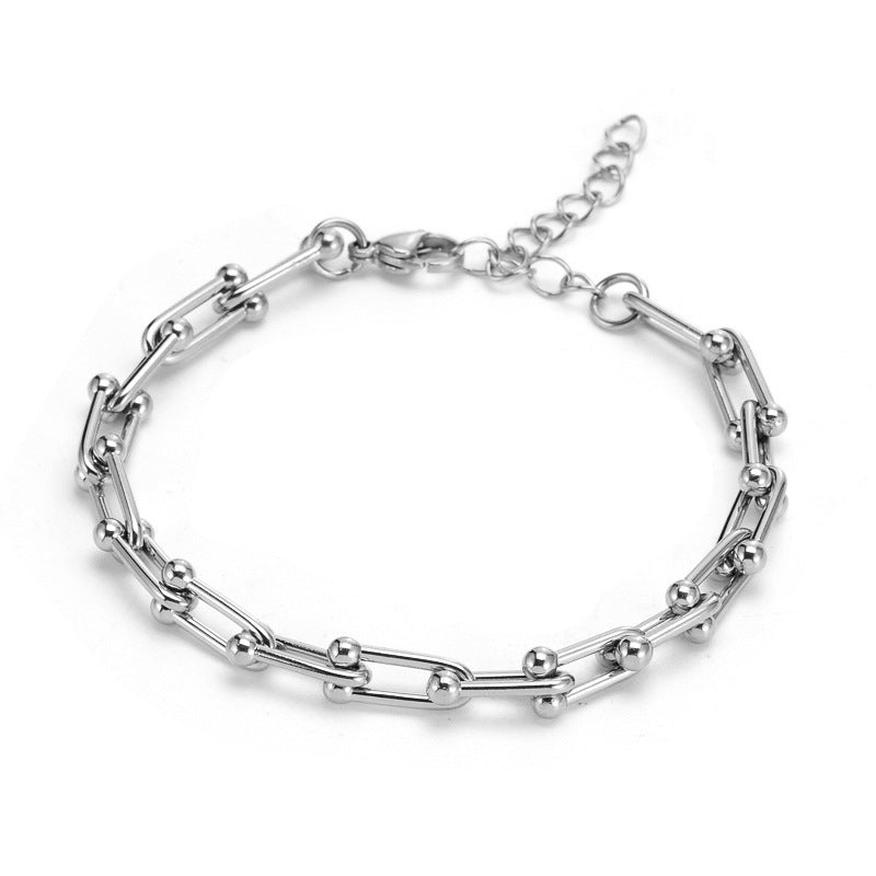 Elegantes Damenarmband aus Titanstahl – Gold- oder Silberoptik – Modernes Hufeisen-Design