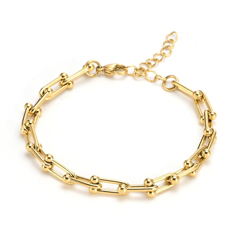 Elegantes Damenarmband aus Titanstahl – Gold- oder Silberoptik – Modernes Hufeisen-Design