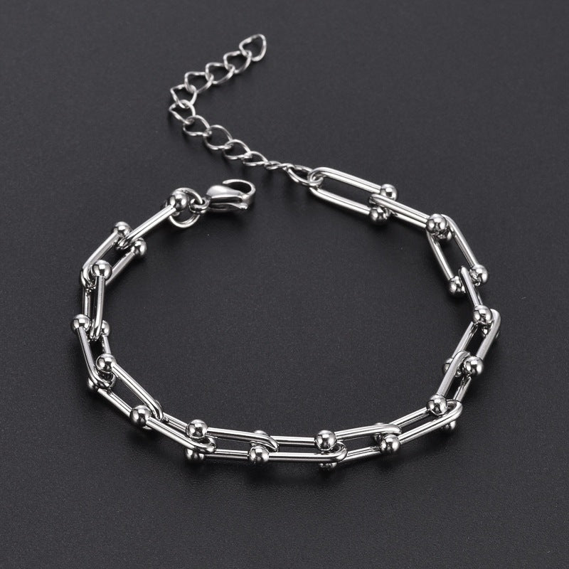 Elegantes Damenarmband aus Titanstahl – Gold- oder Silberoptik – Modernes Hufeisen-Design