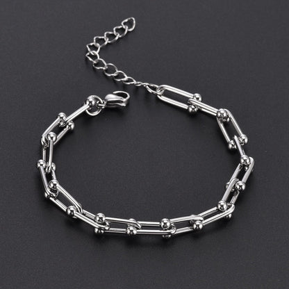 Elegantes Damenarmband aus Titanstahl – Gold- oder Silberoptik – Modernes Hufeisen-Design