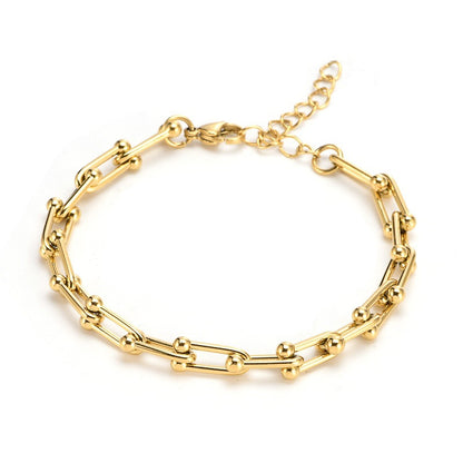 Elegantes Damenarmband aus Titanstahl – Gold- oder Silberoptik – Modernes Hufeisen-Design